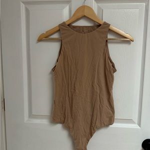 Skims high neck bodysuit in clay